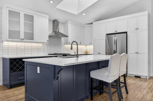 811 Boulder Creek Drive Se, Langdon, AB - Indoor Photo Showing Kitchen With Upgraded Kitchen