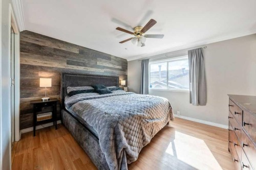 1441 Hunterbrook Road Nw, Calgary, AB - Indoor Photo Showing Bedroom