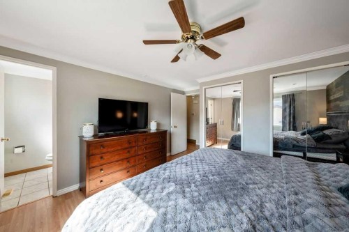 1441 Hunterbrook Road Nw, Calgary, AB - Indoor Photo Showing Bedroom