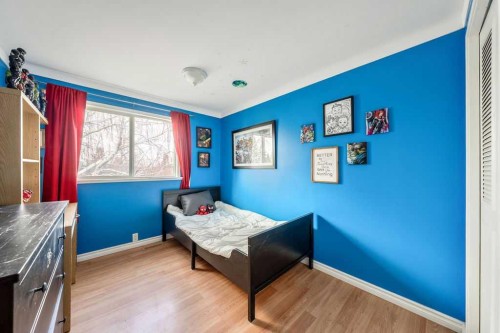 1441 Hunterbrook Road Nw, Calgary, AB - Indoor Photo Showing Bedroom