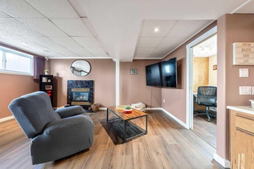 1441 Hunterbrook Road Nw, Calgary, AB - Indoor With Fireplace