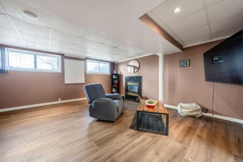 1441 Hunterbrook Road Nw, Calgary, AB - Indoor With Fireplace