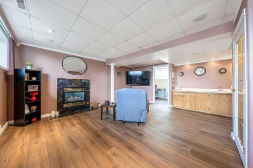 1441 Hunterbrook Road Nw, Calgary, AB - Indoor With Fireplace