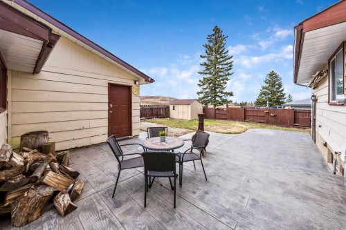 1441 Hunterbrook Road Nw, Calgary, AB - Outdoor With Deck Patio Veranda With Exterior