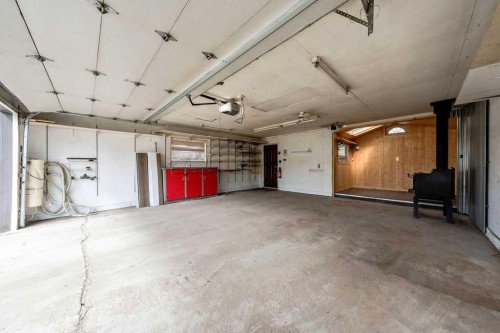 1441 Hunterbrook Road Nw, Calgary, AB - Indoor Photo Showing Garage