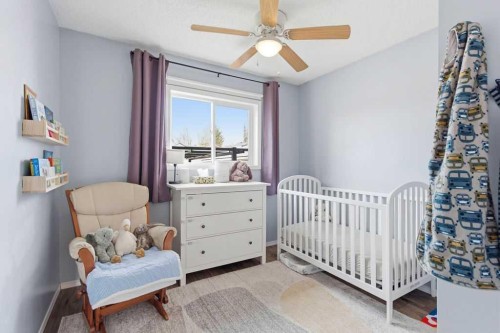 111 Shawglen Road Sw, Calgary, AB - Indoor Photo Showing Bedroom