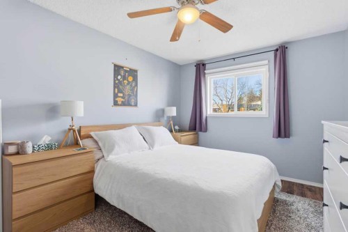 111 Shawglen Road Sw, Calgary, AB - Indoor Photo Showing Bedroom