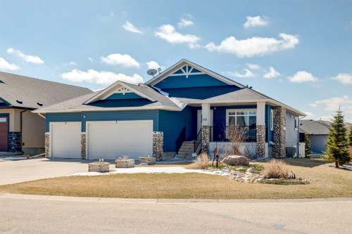 102 Speargrass Crescent, Carseland, AB - Outdoor With Facade
