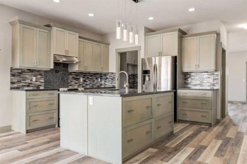 102 Speargrass Crescent, Carseland, AB - Indoor Photo Showing Kitchen With Upgraded Kitchen