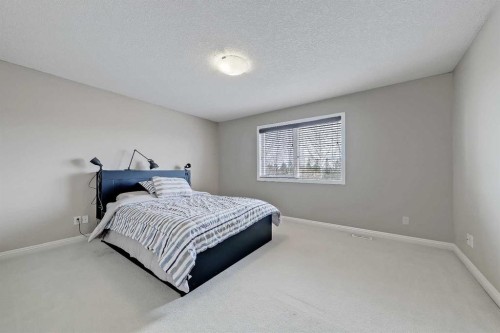 196 Hawkmere Way, Chestermere, AB - Indoor Photo Showing Bedroom