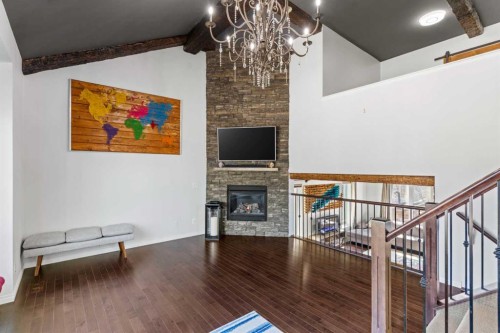 507 Windbrook Heights Sw, Airdrie, AB - Indoor Photo Showing Other Room With Fireplace