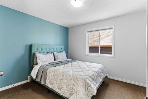 507 Windbrook Heights Sw, Airdrie, AB - Indoor Photo Showing Bedroom