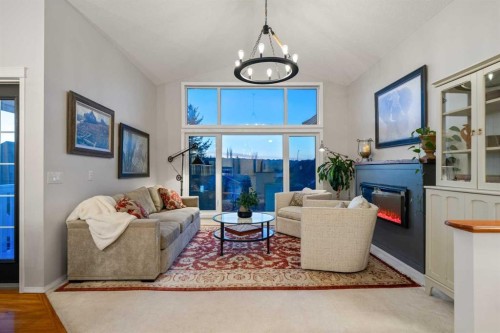 94 Edgebrook Heights Nw, Calgary, AB - Indoor Photo Showing Other Room With Fireplace