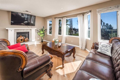 2612 Signal Hill Drive Sw, Calgary, AB - Indoor Photo Showing Living Room With Fireplace