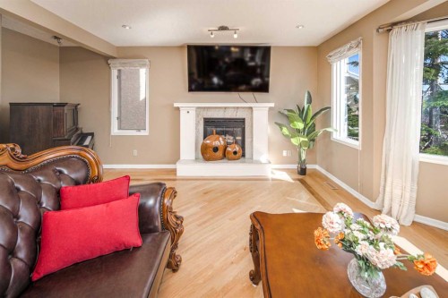 2612 Signal Hill Drive Sw, Calgary, AB - Indoor Photo Showing Living Room With Fireplace