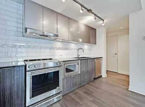 1901-930 6 Avenue Sw, Calgary, AB - Indoor Photo Showing Kitchen With Upgraded Kitchen