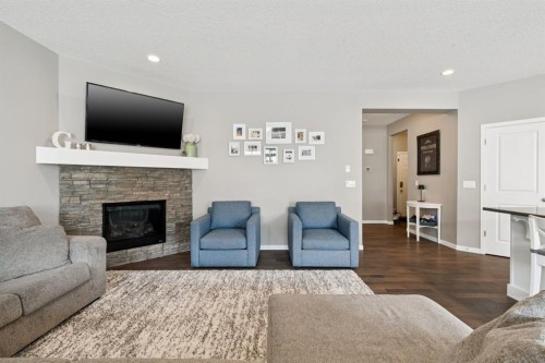 80 Brightoncrest Point Se, Calgary, AB - Indoor Photo Showing Living Room With Fireplace