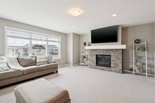 80 Brightoncrest Point Se, Calgary, AB - Indoor Photo Showing Living Room With Fireplace