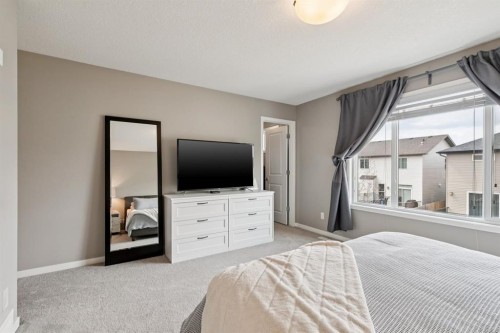 80 Brightoncrest Point Se, Calgary, AB - Indoor Photo Showing Bedroom