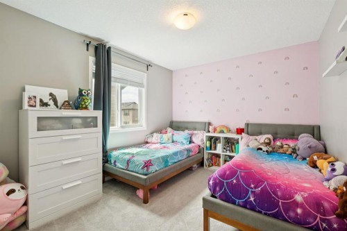 80 Brightoncrest Point Se, Calgary, AB - Indoor Photo Showing Bedroom