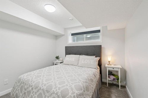 80 Brightoncrest Point Se, Calgary, AB - Indoor Photo Showing Bedroom