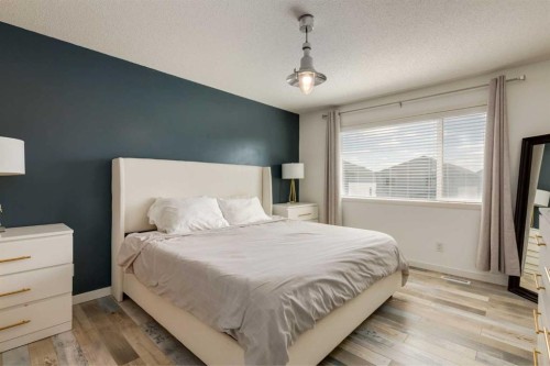 152 Brightoncrest Manor Se, Calgary, AB - Indoor Photo Showing Bedroom