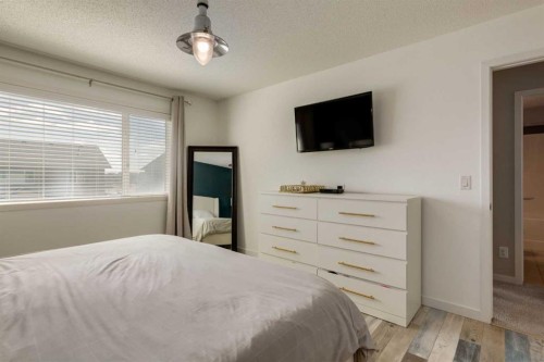 152 Brightoncrest Manor Se, Calgary, AB - Indoor Photo Showing Bedroom