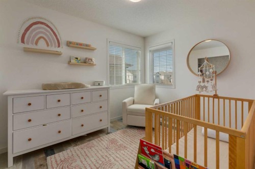 152 Brightoncrest Manor Se, Calgary, AB - Indoor Photo Showing Bedroom