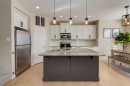152 Brightoncrest Manor Se, Calgary, AB  - Indoor Photo Showing Kitchen With Stainless Steel Kitchen With Double Sink With Upgraded Kitchen 