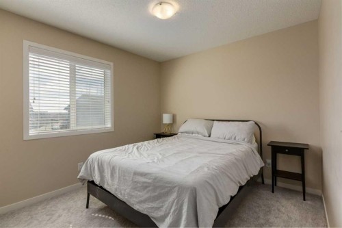 152 Brightoncrest Manor Se, Calgary, AB - Indoor Photo Showing Bedroom