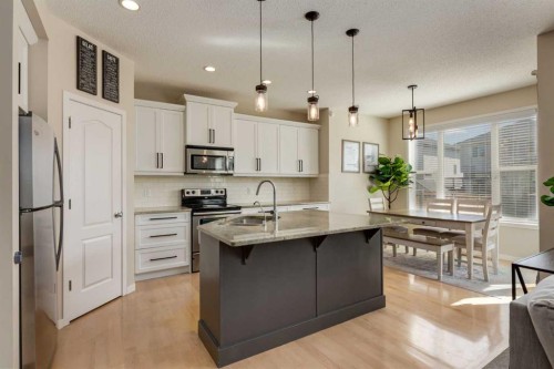152 Brightoncrest Manor Se, Calgary, AB - Indoor Photo Showing Kitchen With Upgraded Kitchen