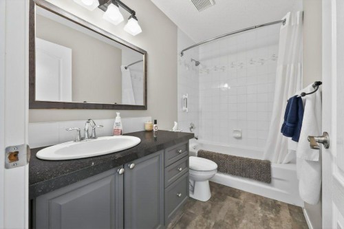 7 Henderson Bay Ne, Langdon, AB - Indoor Photo Showing Bathroom