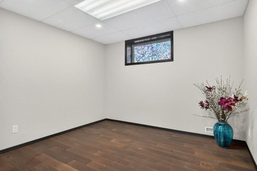 7 Henderson Bay Ne, Langdon, AB - Indoor Photo Showing Other Room