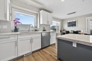 7 Henderson Bay Ne, Langdon, AB  - Indoor Photo Showing Kitchen With Upgraded Kitchen 