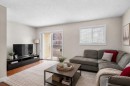 89 Pantego Lane Nw, Calgary, AB  - Indoor Photo Showing Living Room 
