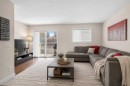 89 Pantego Lane Nw, Calgary, AB  - Indoor Photo Showing Living Room 