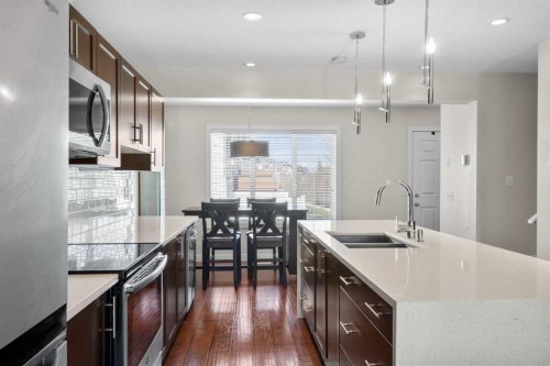 89 Pantego Lane Nw, Calgary, AB - Indoor Photo Showing Kitchen With Double Sink With Upgraded Kitchen