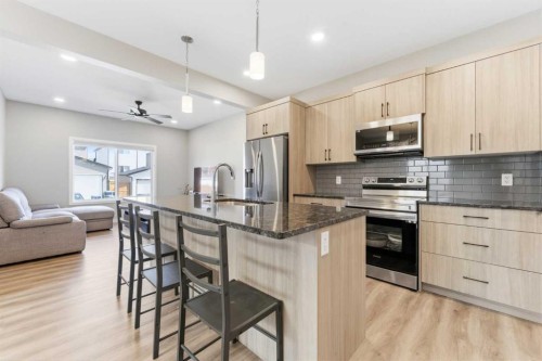 132 Highview Gate Se, Airdrie, AB - Indoor Photo Showing Kitchen With Upgraded Kitchen