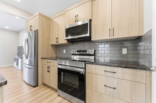 132 Highview Gate Se, Airdrie, AB - Indoor Photo Showing Kitchen