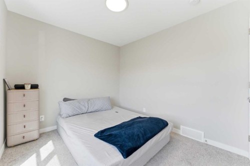 132 Highview Gate Se, Airdrie, AB - Indoor Photo Showing Bedroom