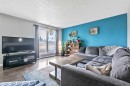 399 Maitland Crescent Ne, Calgary, AB  - Indoor Photo Showing Living Room 