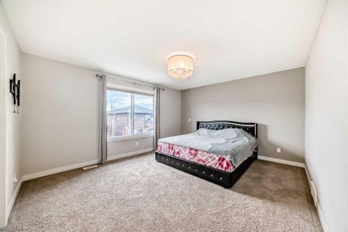 105 Sandpiper Point, Chestermere, AB - Indoor Photo Showing Bedroom