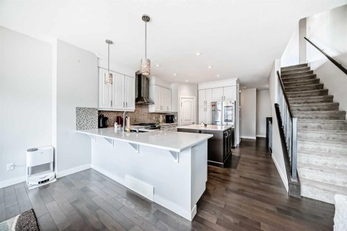 105 Sandpiper Point, Chestermere, AB - Indoor Photo Showing Kitchen With Upgraded Kitchen