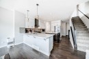 105 Sandpiper Point, Chestermere, AB  - Indoor Photo Showing Kitchen With Upgraded Kitchen 