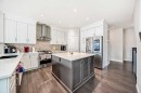 105 Sandpiper Point, Chestermere, AB  - Indoor Photo Showing Kitchen With Upgraded Kitchen 