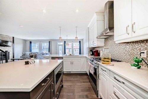 105 Sandpiper Point, Chestermere, AB - Indoor Photo Showing Kitchen With Upgraded Kitchen