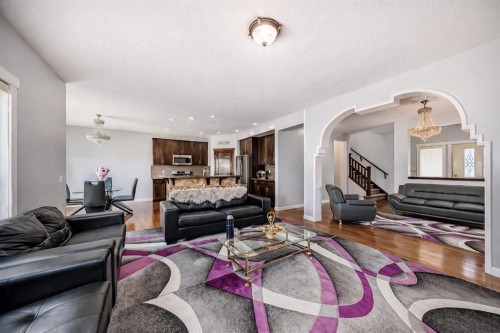 104 Panamount Terrace Nw, Calgary, AB - Indoor Photo Showing Living Room