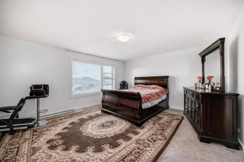 104 Panamount Terrace Nw, Calgary, AB - Indoor Photo Showing Bedroom