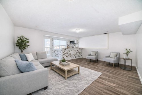 104 Panamount Terrace Nw, Calgary, AB - Indoor Photo Showing Living Room