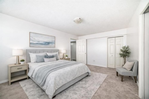 104 Panamount Terrace Nw, Calgary, AB - Indoor Photo Showing Bedroom